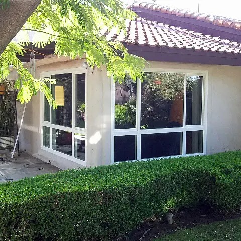Modern replacement windows installed on a residential home, enhancing natural light, energy efficiency, and curb appeal in Temecula, CA.