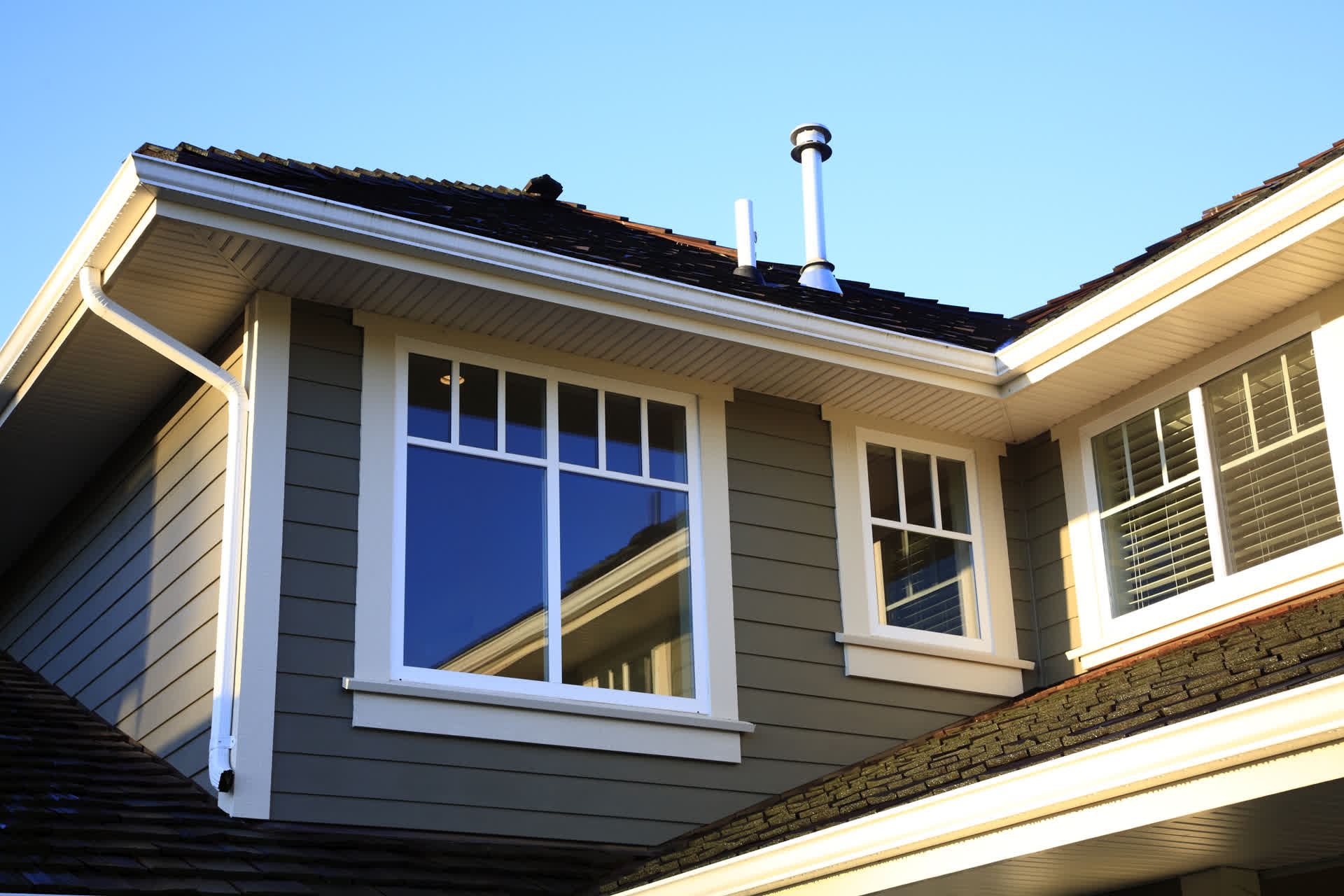 Energy-efficient replacement windows enhancing curb appeal and natural light for a Riverside, CA home.