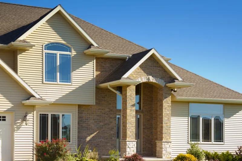 Beautiful two-story home with updated energy-efficient windows and enhanced curb appeal, showcasing expert window replacement Corona, CA for lasting performance and style.